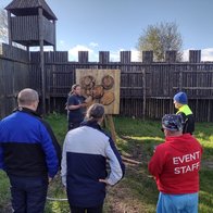 A group of veterans taking part in an archery class